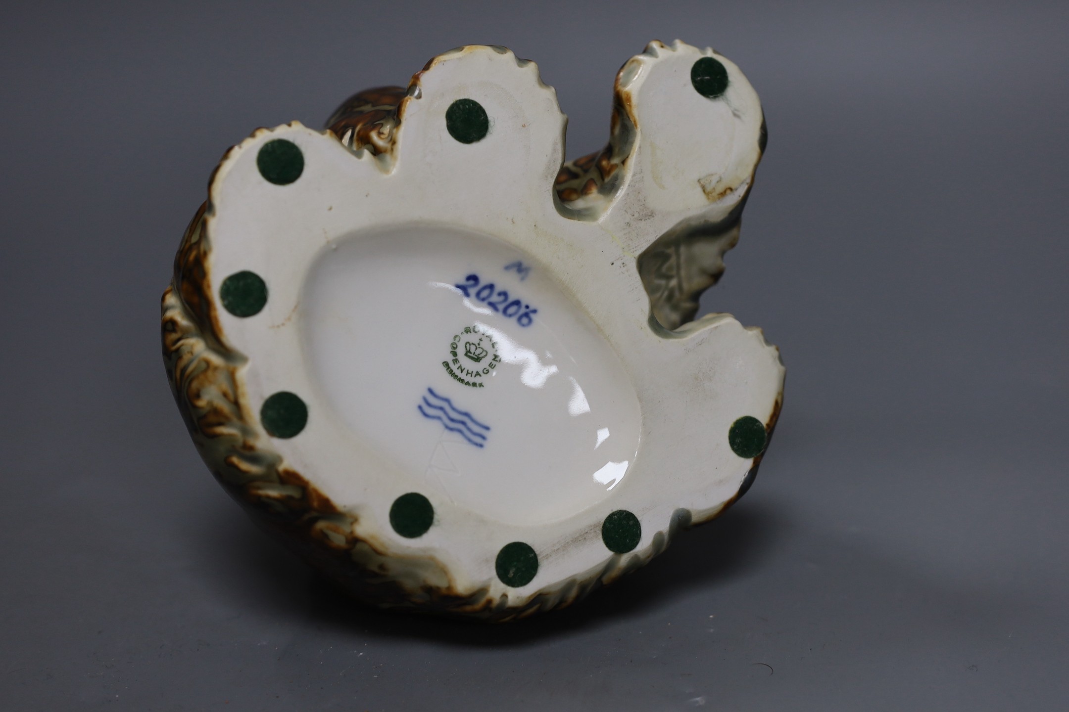 A Royal Copenhagen stoneware model of a bear, marked, M 20208, 17.5cms high